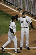 Chicago White Sox outfielder Scott Podsednik (22), left, is congratulated  by teammate A.J. Pierzynski (12) after hitting the game winning home run in  game 2 of the World Series at U. S.