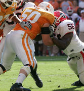 Chicago Bears linebacker Hunter Hillenmeyer (92) tackles Green Bay Packers  receiver Donald Driver (80) after a