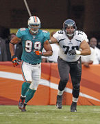 Jacksonville Jaguars Vs. Miami Dolphins. Fans Support On NFL Game.  Silhouette Of Supporters, Big Screen With Two Rivals In Background. Stock  Photo, Picture and Royalty Free Image. Image 151160305.