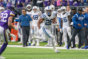 Minnesota Vikings fullback C.J. Ham (30) runs from Indianapolis Colts  inside linebacker Bobby Okereke (58) during