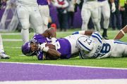 Minnesota Vikings fullback C.J. Ham (30) runs from Indianapolis Colts  inside linebacker Bobby Okereke (58) during