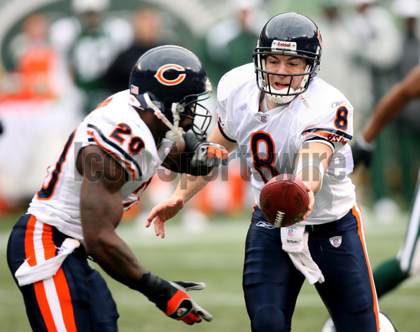 Cedric Benson of the Chicago Bears celebrates his touchdown with Rex