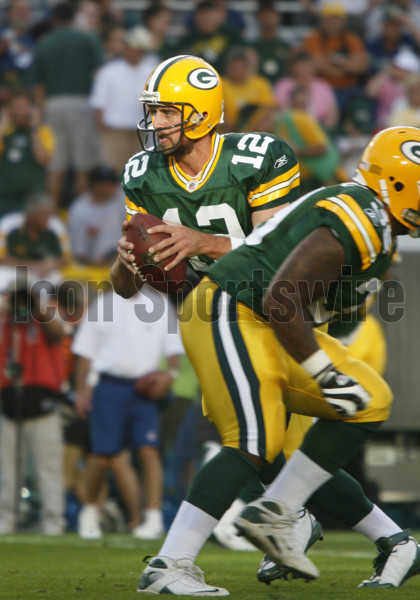 11 August 2008: Green Bay Packers starting quarterback Aaron Rodgers (12)  watches from the sidelines after Packers tight end Ruvell Martin was  injured in the second quarter of a pre season NFL football game with the  Cincinnati Bengals at Lambeau Field