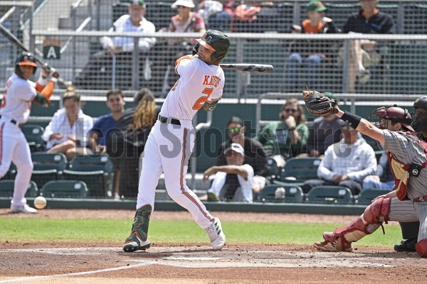 Miami infielder CJ Kayfus rounds the bases after hitting a solo