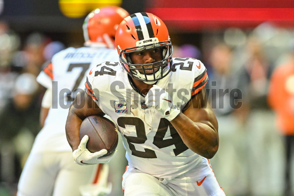 ATLANTA, GA - OCTOBER 02: Atlanta Falcons running back Tyler Allgeier (25)  is tackled by Cleveland Browns linebacker Jacob Phillips (50) during the  NFL game between the Cleveland Browns and Atlanta Falcons