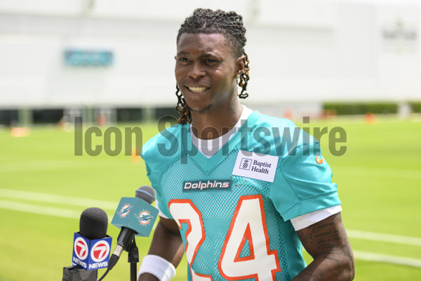 Miami Dolphins cornerback Cam Smith stretches during practice at