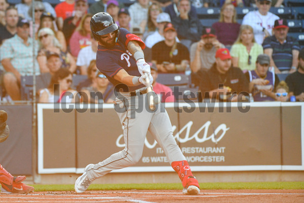 WORCESTER, MA - JUNE 22: Worcester Red Sox bat boy Aaron Buckley (left) and  sports broadcaster and former NFL quarterback Scott Zolak (right) pose for  a photo after Zolak threw out a