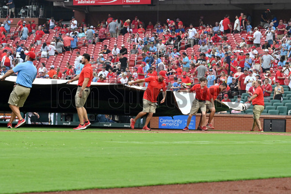 ST. LOUIS, MO - JULY 16: St. Louis Cardinals catcher Andrew Knizner (7)  congratulates St. Louis Cardinals relief pitcher JoJo Romero (59) after  winning a MLB game between the Washington Nationals and