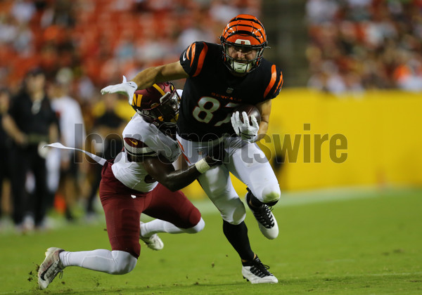 Cincinnati Bengals defensive end Jeff Gunter (93) sacks Washington  Commanders quarterback Jake Fromm (11) during the