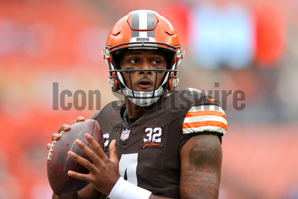 Cleveland Browns wide receiver Amari Cooper (2) is upended by