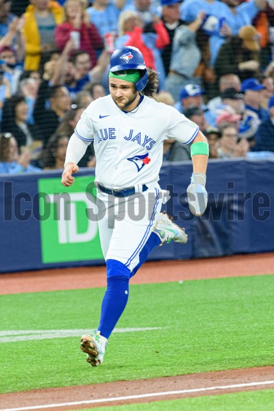 TORONTO, ON - SEPTEMBER 26: Toronto Blue Jays Catcher Alejandro Kirk (30)  bats during the MLB baseball regular season game between the Tampa Bay Rays  and the Toronto Blue Jays on September